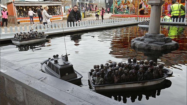migrant-boats-dismaland-banksy-theme-park-europe